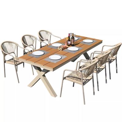 Außenhof Villa Stühle und Tische Garten Freiluftbalkon Freizeit Rattan Esszimmermöbel Set mit Holztisch aus Kunststoff.