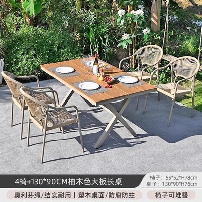Außenhof Villa Stühle und Tische Garten Freiluftbalkon Freizeit Rattan Esszimmermöbel Set mit Holztisch aus Kunststoff.